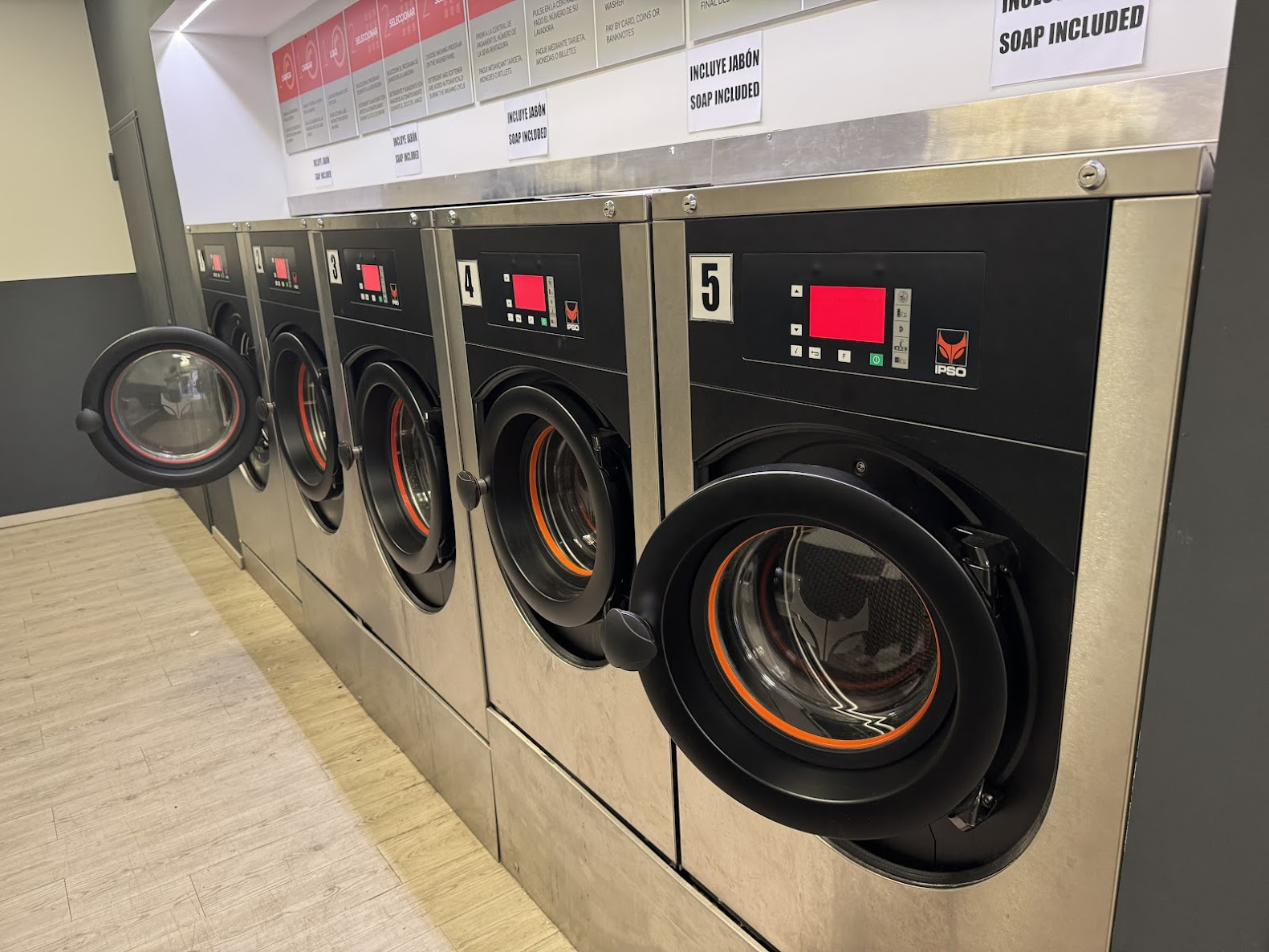 Speed Queen washers at Nou de la Rambla Ciutat Vella with numbered doors