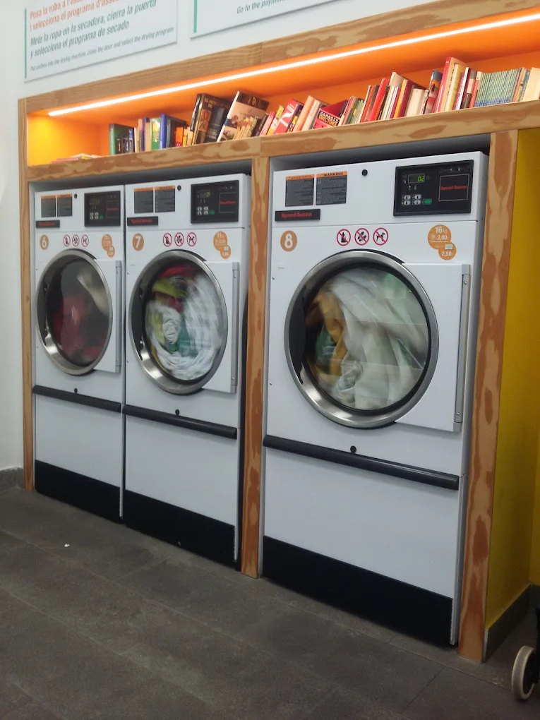 Speed Queen washing machines and dryers inside Señor Espuma Sant Martí laundromat