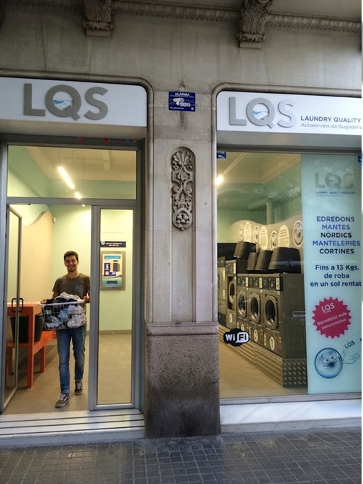 LQS Laundry Quality Services self-service laundromat storefront at Carrer de Casanova 172, Eixample Barcelona